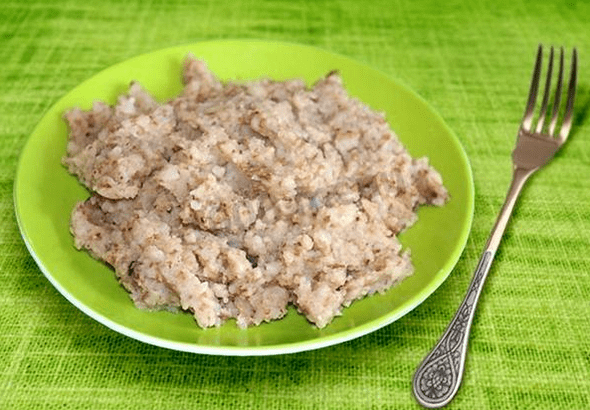 Porridge made of shredded buckwheat with man